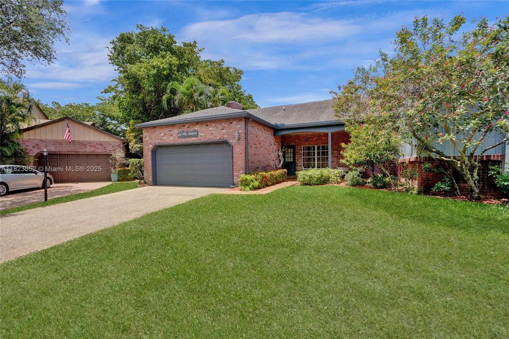 Photo of 6653 Stratford Dr, Parkland, FL 33067 (MLS # A11823552)