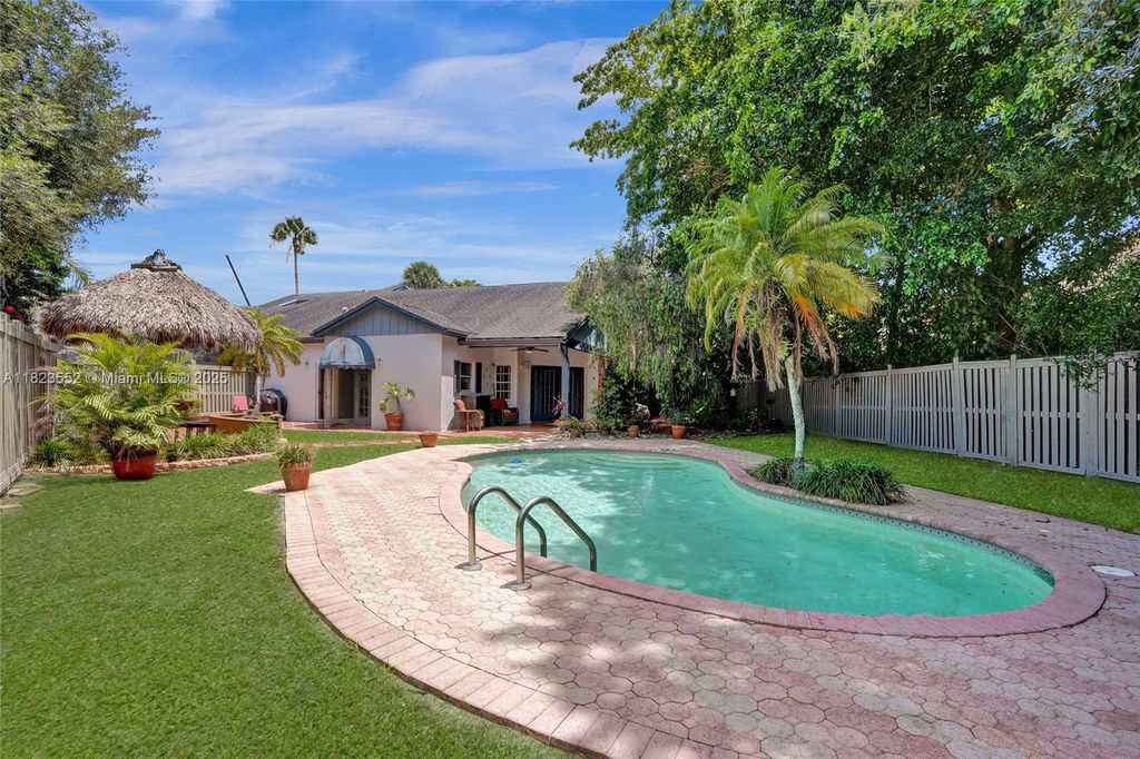 Photo of 6653 Stratford Dr, Parkland, FL 33067 (MLS # A11823552)