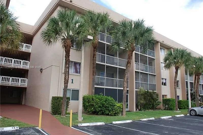 Conveniently located in the heart of Miami Lakes, this spacious apartment offers over 1,000 sq ft of beautifully designed living space in a well-maintained community. Enjoy walking distance to shopping centers and immediate access to major expressways. The unit features a smart layout, custom closets, a large balcony, and a private view with no direct sightlines into the unit — offering both comfort and privacy. This gem is a must-see!