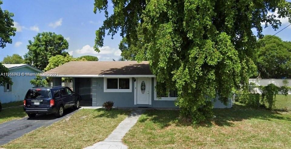 TURNKEY INVESTMENT OPPORTUNITY OR PRIMARY RESIDENCE! Currently split into a duplex 2/1 & 1/1 income producing property. Can be easily reconverted into 3/2 full single family home. The home has a covered patio and laundry room with washer and dryer and additional storage room. Kitchen, bathroom, flooring, appliances updated in 2019. Impact windows installed 2021. Water heater and AC 2015. Beautiful back yard with large shed. Minutes from the beaches, FTL Airport, All major highways, shopping centers, and more. Home is professionally maintained and inspections will come back squeaky clean.