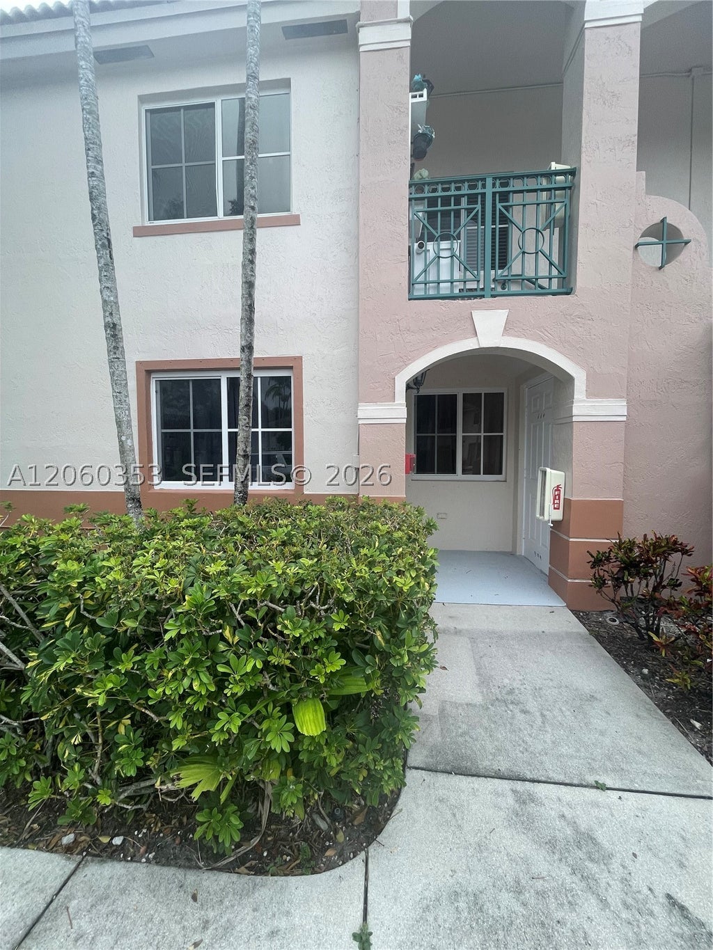 Photo of 2151 NW 77th Way #102, Pembroke Pines, FL 33024 (MLS # A12060353)
