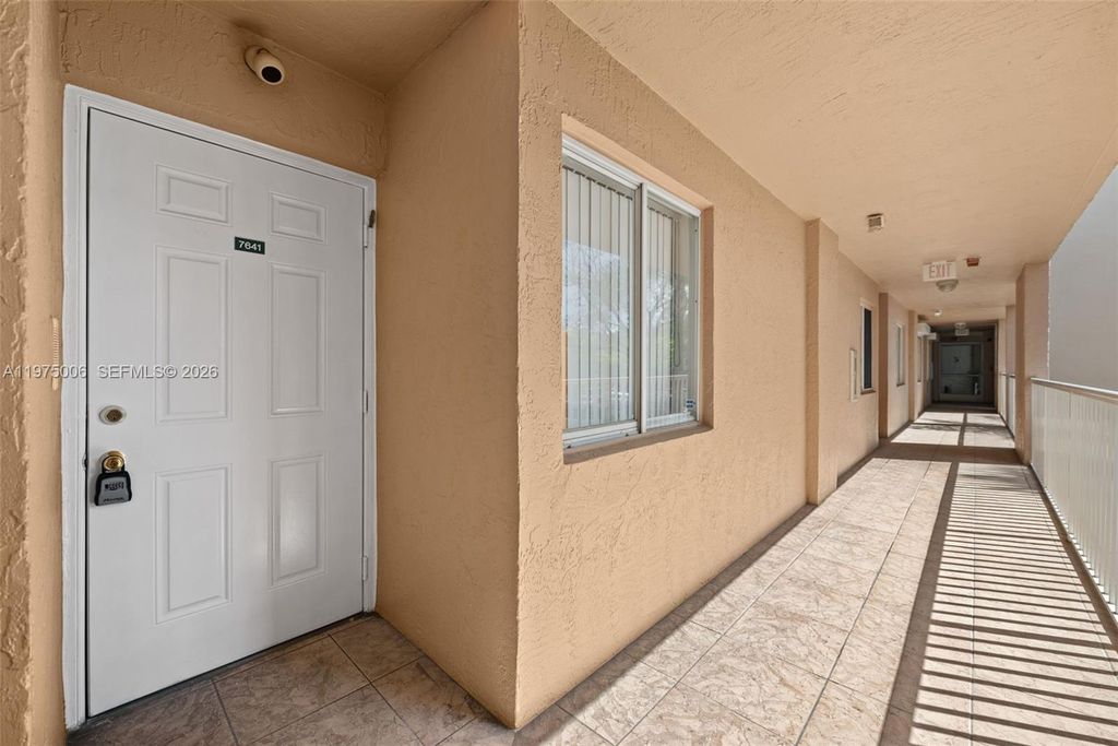 Photo of 7641 Granville Dr #209, Tamarac, FL 33321 (MLS # A11975006)
