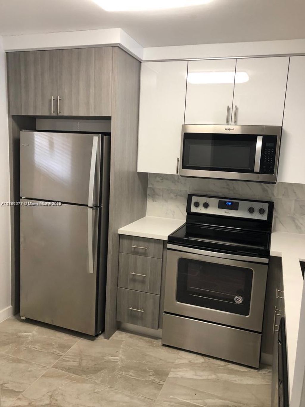 Photo of 3199 Foxcroft Rd #109, Miramar, FL 33025 (MLS # A11850277)