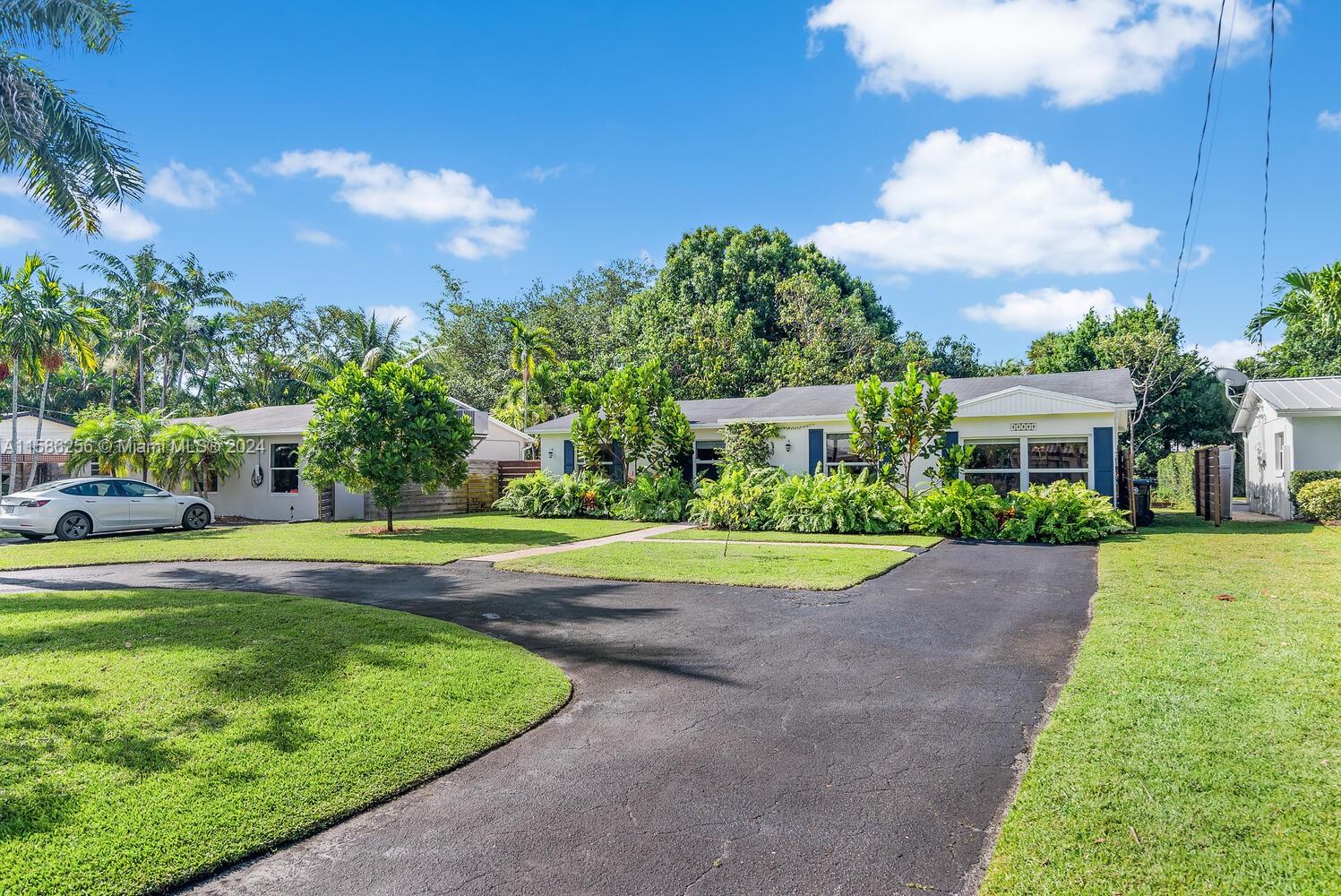 A wonderful opportunity to have it all! Single-family home with a spacious open floor plan on an oversized 11,500 SF lot. This home is tucked away in a quiet residential neighborhood just minutes to the beach, local parks, downtown Fort Lauderdale, and all it has to offer.
The open floorplan to this 3 bedroom, 2 bath, provides easy access for family and friends to move comfortably throughout the living room, dining room and kitchen, while the owners can retain the privacy of the 3 bedrooms down the hallway. Renovations throughout the home include, but are not limited to, the flooring, ceiling, kitchen, bathrooms and a permitted storage shed in an abundantly spacious backyard.
