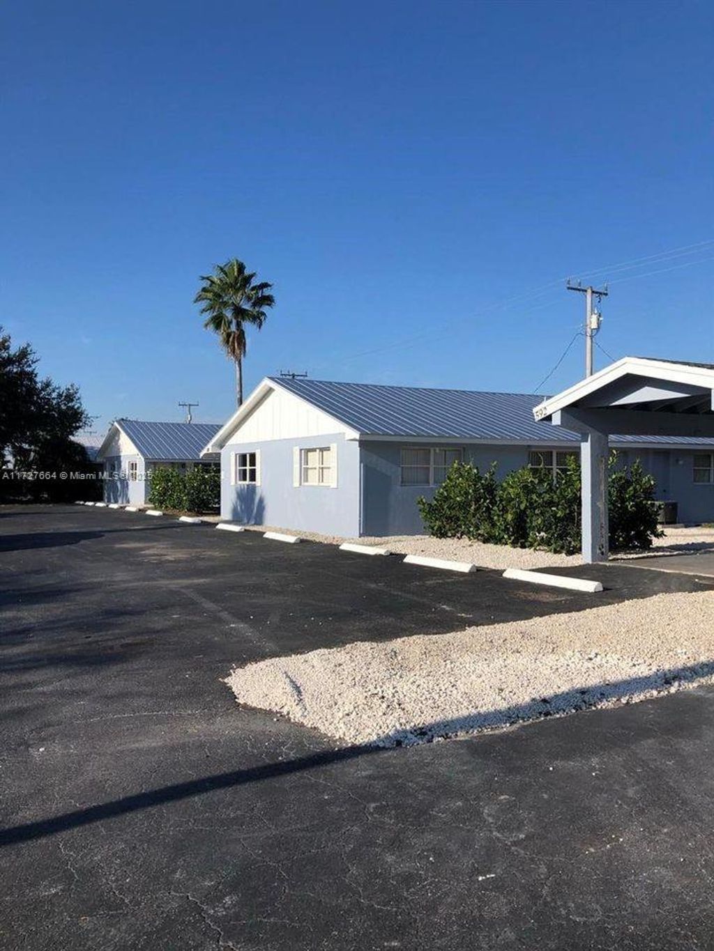 Photo of 584 Holly Dr #B, Palm Beach Gardens, FL 33410 (MLS # A11727664)