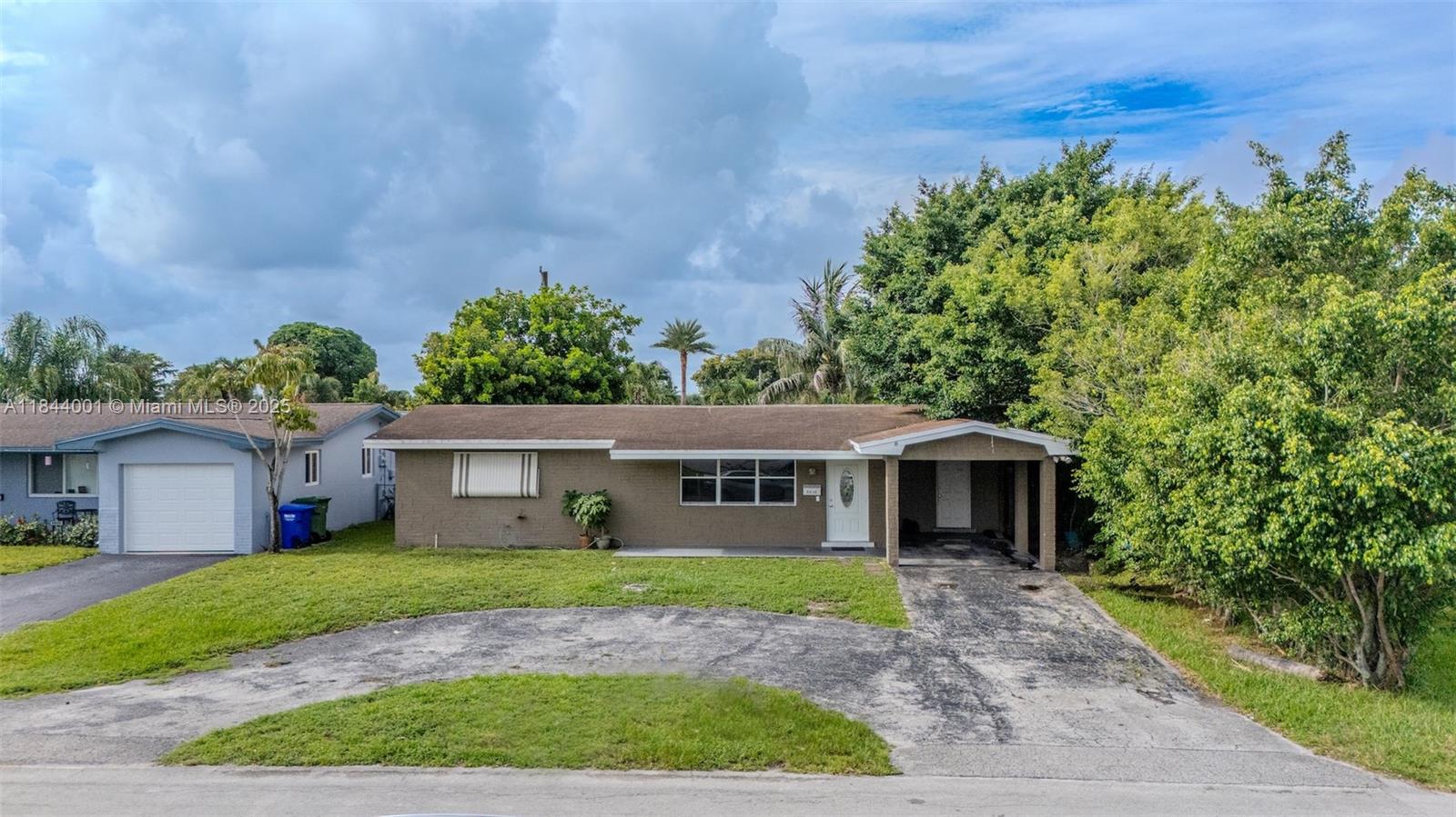 Welcome to this beautifully maintained home located in the heart of Pembroke Pines! This charming residence features an open floor plan with an updated kitchen and tile throughout. The home includes a permitted additional room that can easily be used as a third bedroom or a private in-law suite, offering flexible living space. Freshly painted inside and out, this home is truly move-in ready. The fully fenced backyard is perfect for entertaining, with plenty of room for a pool. No HOA! Conveniently located near top-rated schools, shopping, dining, and major highways. Don’t miss this gem!