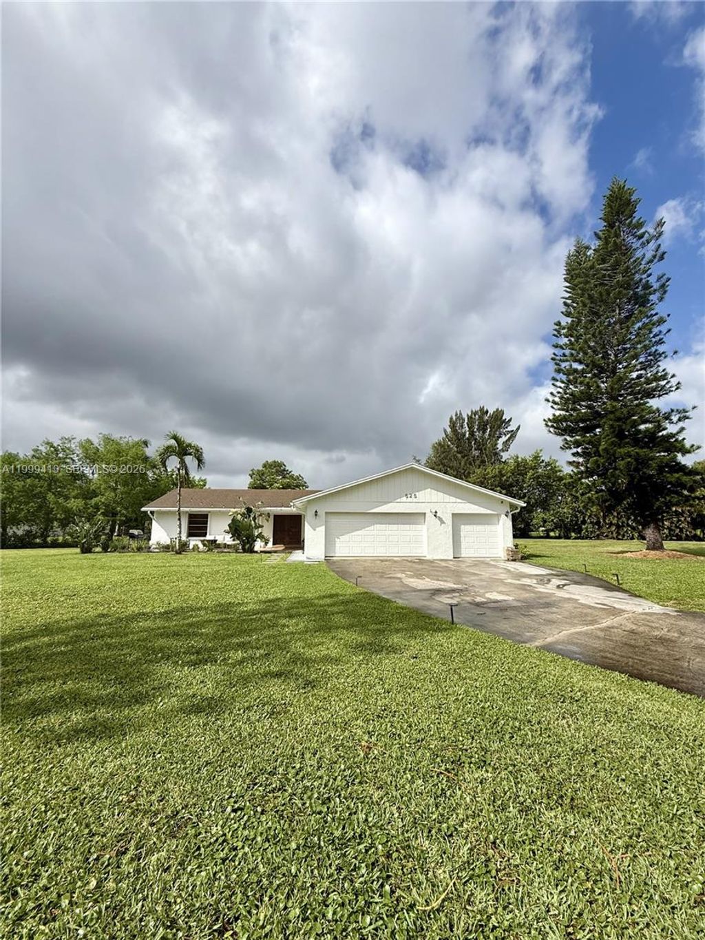 Photo of 625 Whippoorwill Ter #, West Palm Beach, FL 33411 (MLS # A11999419)