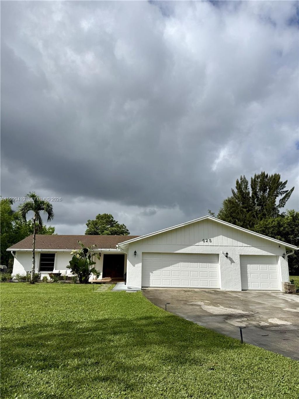 Photo of 625 Whippoorwill Ter #, West Palm Beach, FL 33411 (MLS # A11999419)