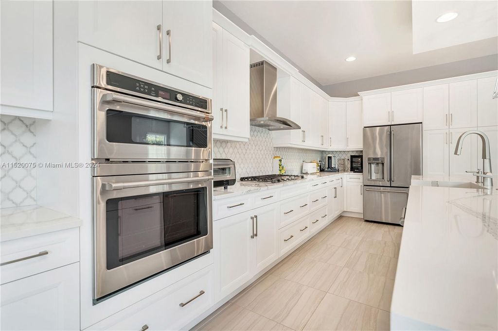 Photo of 13265 Machiavelli Way, Palm Beach Gardens, FL 33418 (MLS # A11520075)