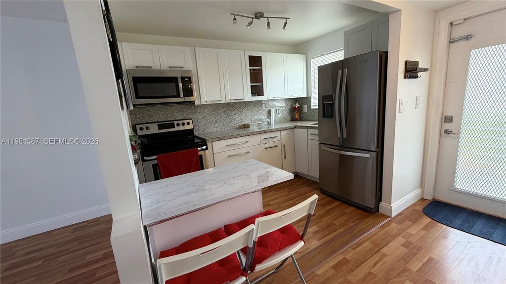 Photo of 8300 Sunrise Lakes Blvd #109, Sunrise, FL 33322 (MLS # A11981387)