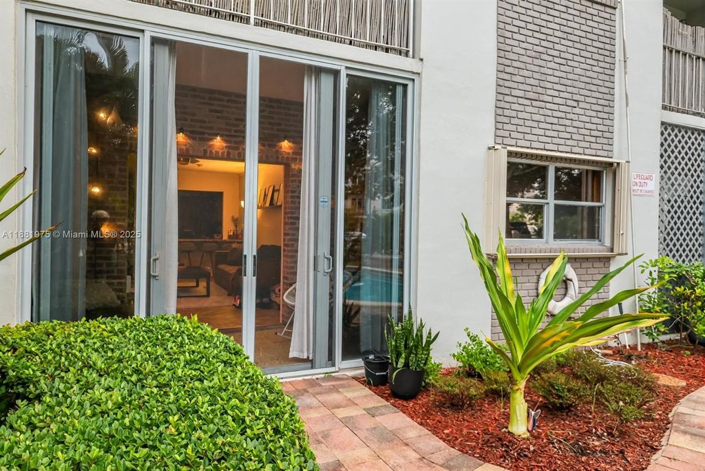 Photo of 1541 NE 34th Ct #104, Oakland Park, FL 33334 (MLS # A11881975)