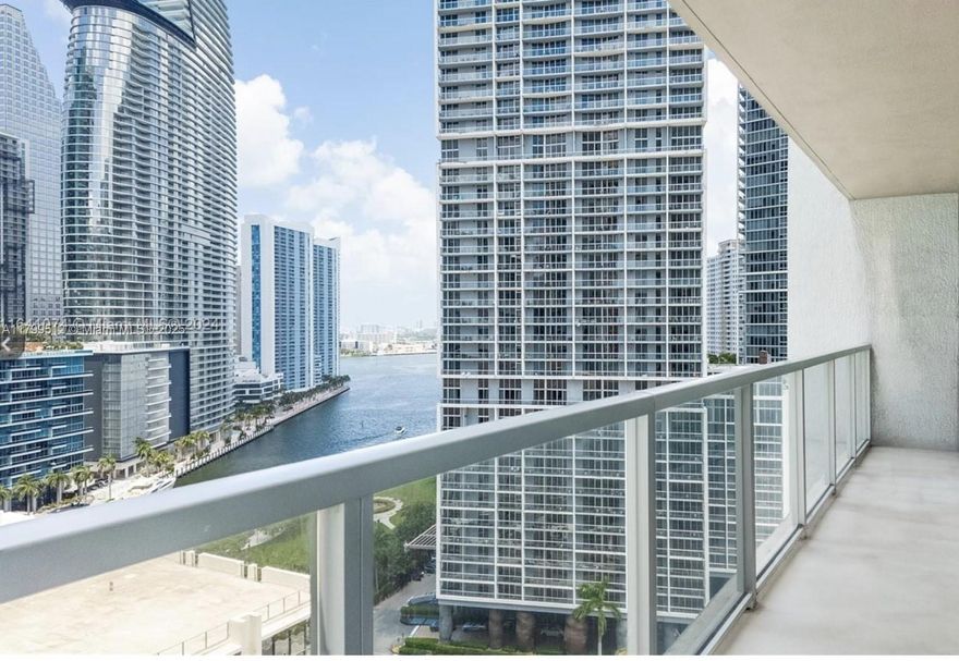 Prime Location! Gorgeous 2 bed/2 bath waterfront unit with direct views of the Miami River, Biscayne Bay, and skyline. One of 500 Brickell’s best split layouts with new 6-ft wood plank floors throughout. Spacious kitchen features quartz countertops, stainless steel appliances, and new dishwasher. Primary suite includes dual marble vanities, jacuzzi tub, and glass shower. Upgrades: custom closets, blackout blinds, sleek fixtures, and new A/C. Amenities: 3 pools, spa, gym, club room, sports bar, rooftop lounge, wine cellar, and theater. Steps to Mary Brickell Village shops. No assessments