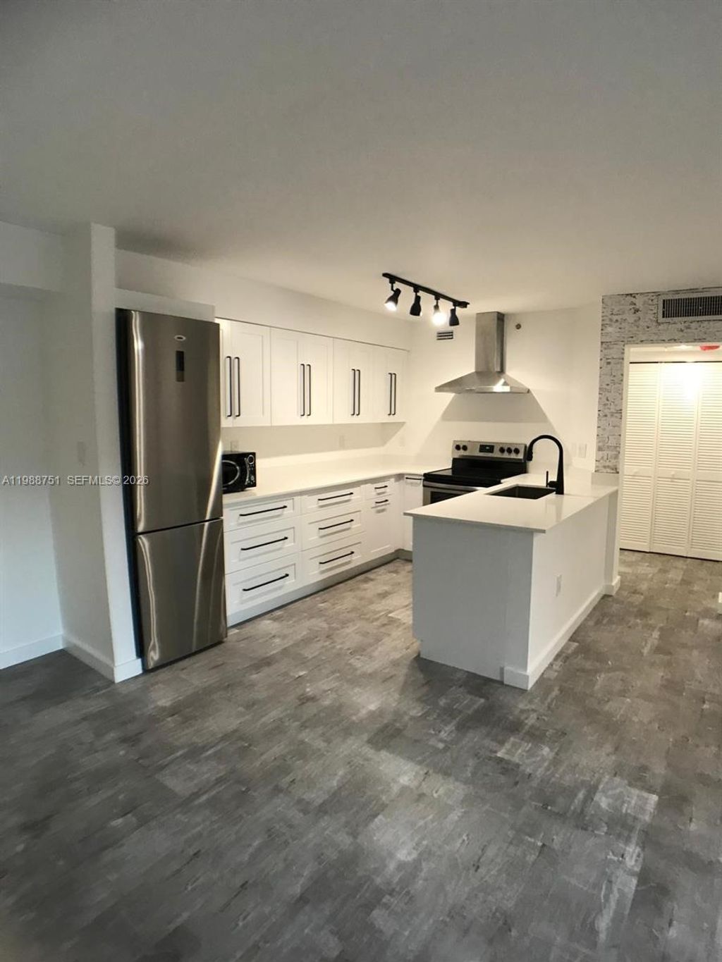 Photo of 751 N Pine Island Rd #211, Plantation, FL 33324 (MLS # A11988751)