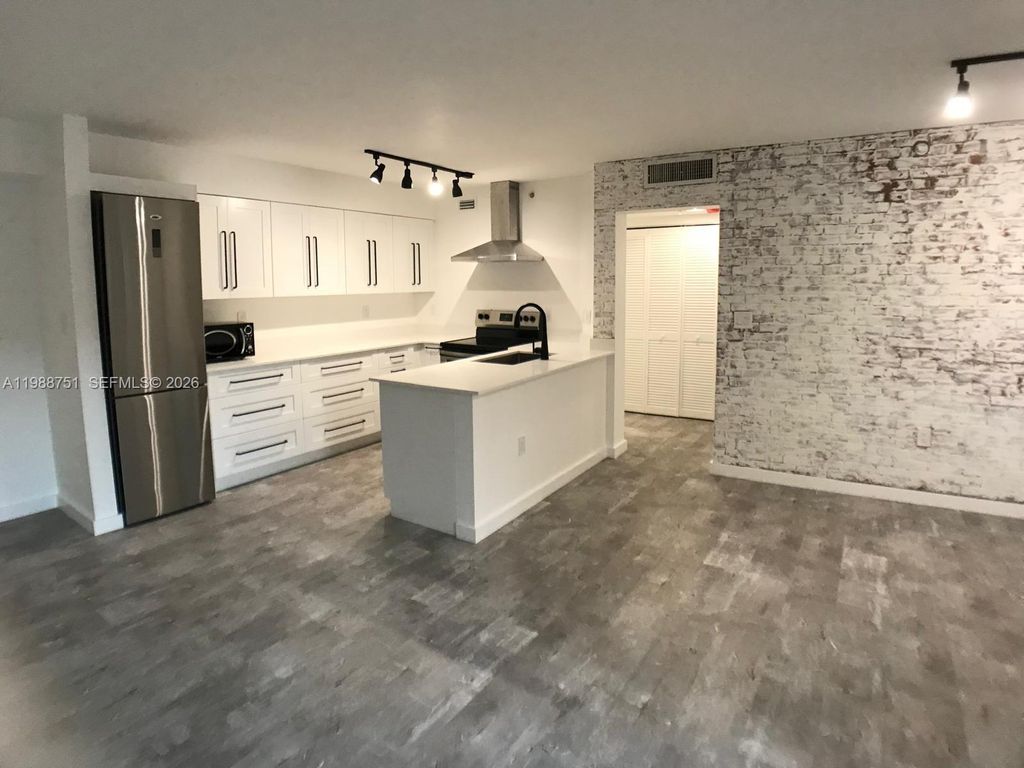 Photo of 751 N Pine Island Rd #211, Plantation, FL 33324 (MLS # A11988751)