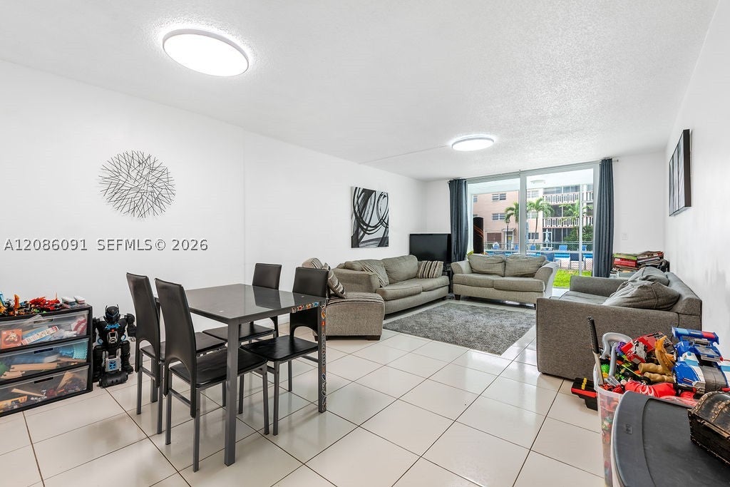 Photo of 319 NE 14th Ave #106, Hallandale Beach, FL 33009 (MLS # A12086091)