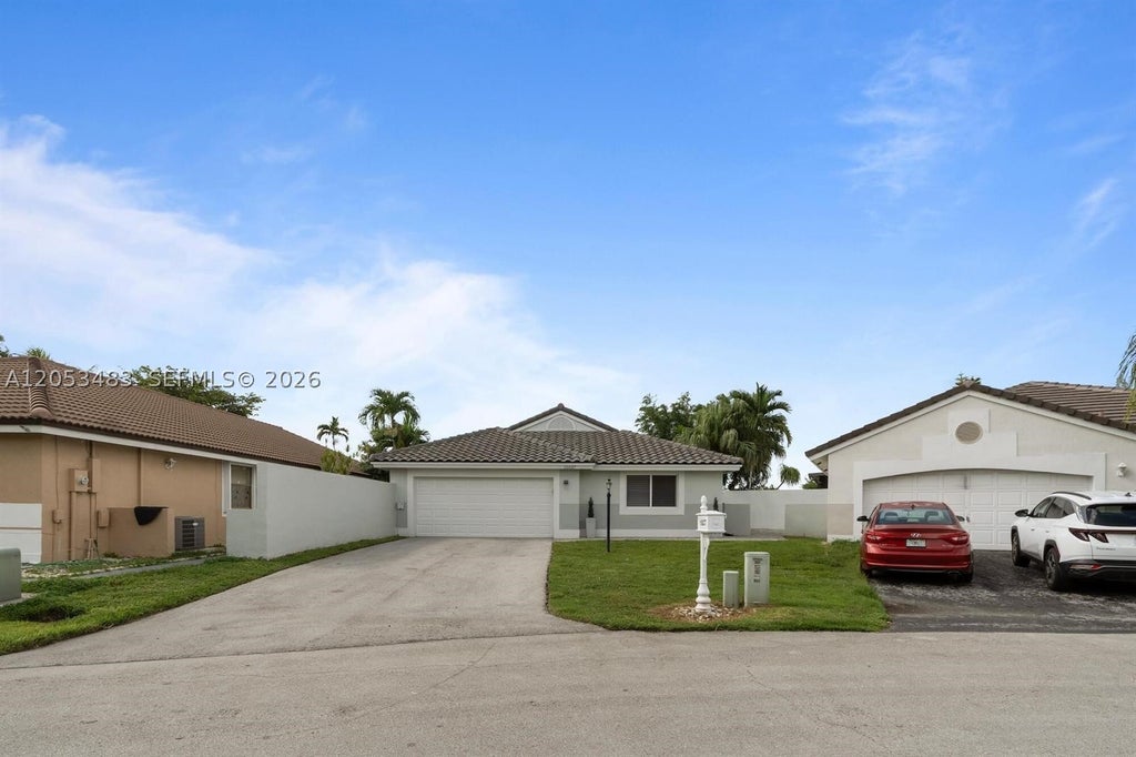 Photo of 15037 Brighton Ln, Davie, FL 33331 (MLS # A12053483)
