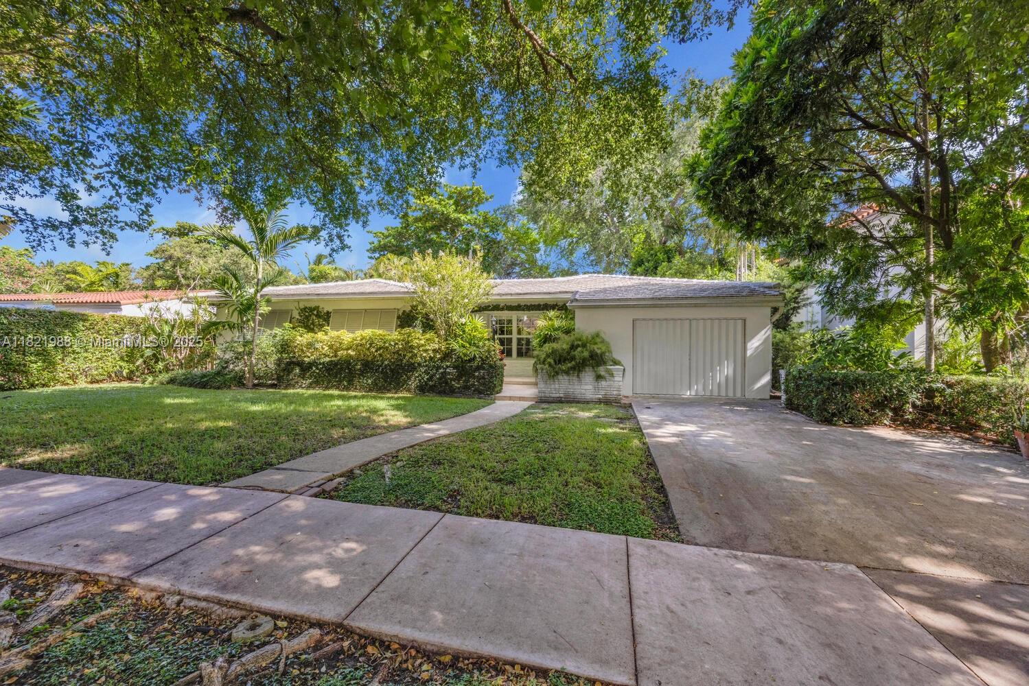 Located on a picturesque, tree lined street in the heart of Coral Gables, this 3 bedroom, 2 bathroom residence sits on a generous 7,875 sq ft lot & offers a rare opportunity to personalize a classic home in one of Miami’s most sought after neighborhoods. Featuring original terrazzo flooring, a 1 car garage & partial impact windows, the home combines timeless charm with solid bones. The bathrooms have been tastefully updated, & the roof, approximately 10 years old, remains in good condition. Whether you choose to move in as is or renovate to suit your vision, this property presents a wonderful canvas. Enjoy the elegance of Coral Gables living, just moments from the Biltmore Hotel, Granada Golf Course, Miracle Mile & top schools. Don’t miss your chance to own a piece of "The City Beautiful."