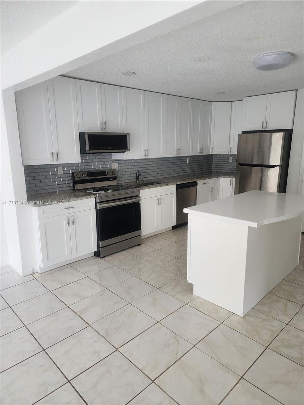 Photo of 11081 NW 39th St #A, Coral Springs, FL 33065 (MLS # A11770724)