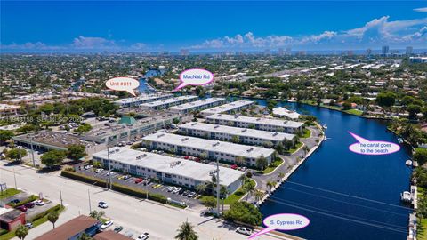 Photo of 180 Cypress Club Dr #811, Pompano Beach, FL 33060 (MLS # A11943158)