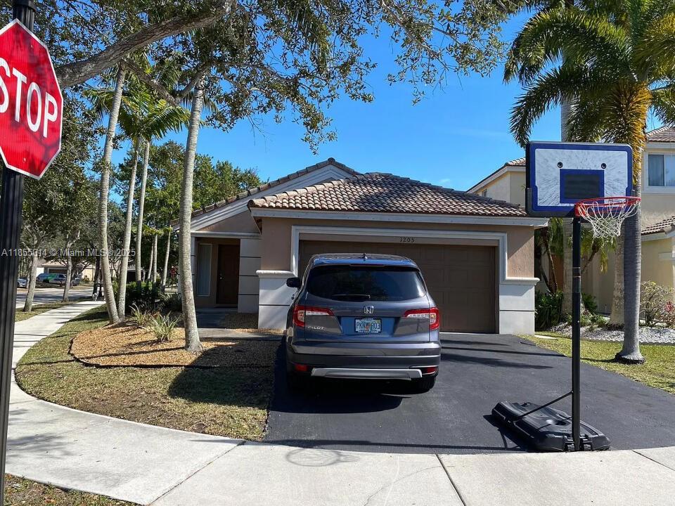 Welcome to your dream rental home! This spacious and inviting house offers the perfect blend of comfort, style, and functionality. With 3 bedrooms and 2 bathrooms, it is a good choice for families or individuals seeking ample space and privacy. This stunning home boasts a 2-car garage and 2 additional car spaces, situated on a desirable corner lot. Located in a excellent area of south Florida, it is surrounded by top-rated schools, ensuring the highest quality education for your family.