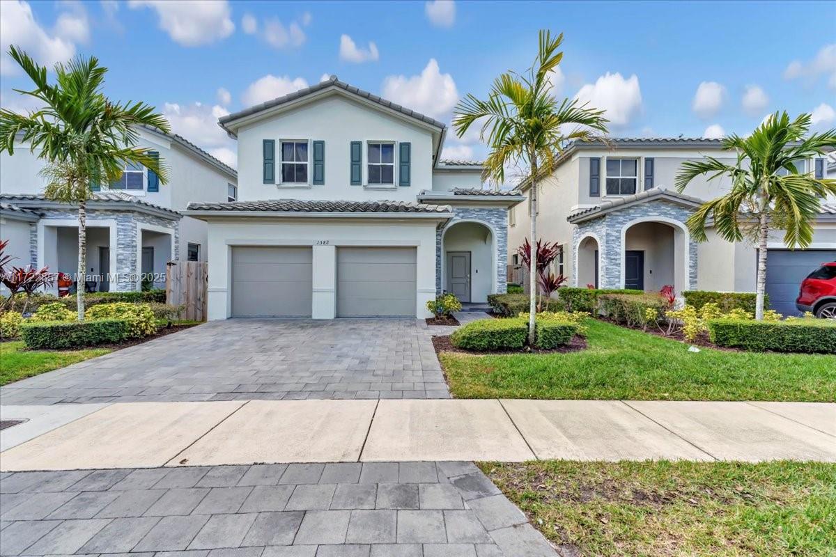Discover this spacious two-story home, built in 2021, perfect for family living and entertaining. It features five bedrooms, three bathrooms, and an open-concept kitchen with ample counter space, stainless steel appliances, and plenty of storage. Enjoy the convenience of a first-floor bedroom, ideal for guests or a home office. The master suite boasts a large walk-in closet, while the other bedrooms are generously sized for comfort.
Upgrades include accordion shutters, modern lighting, rain gutters, and a fully fenced yard for privacy. Located in The Riviera Community, near the community park and very close to the clubhouse, which includes a gym, and a beautiful pool. This home is move-in ready. Schedule your tour today! This gem won’t last long!