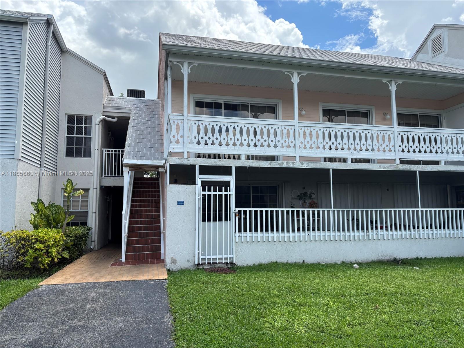 Beautiful remodeled kitchen in this corner unit located on the first floor in a gated community. This property is conveniently located within walking distance of public transportation, shopping centers, restaurants, supermarkets, and more. Enjoy all the amenities that Hammocks has to offer, including a private lake beach exclusively for Hammocks residents, a tennis court, pools, and a clubhouse. Unit is all tile through, split floor plan with two balconies, one of them looking at the lake and green area of the hammocks. Easy to show and easy to purchase, the owner is offering financing.