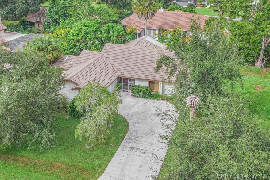 Come take a look at this lovely home in the community of River's Edge. Home has an open floorplan and volume ceilings and features conversation pit with wet bar and a working fireplace. Laminate flooring runs through living areas while carpeting is in bedrooms. Spacious kitchen features granite countertops, stainless steel appliances, and closet pantry. Master suite has dual sinks, oversized walk-in shower, and water closet. Step outside the family room and you will find a covered, screened-in patio, in addition to a private courtyard located off the master suite and dining room. As an added bonus, this home is in a community with a very LOW HOA and No Rentals Allowed!