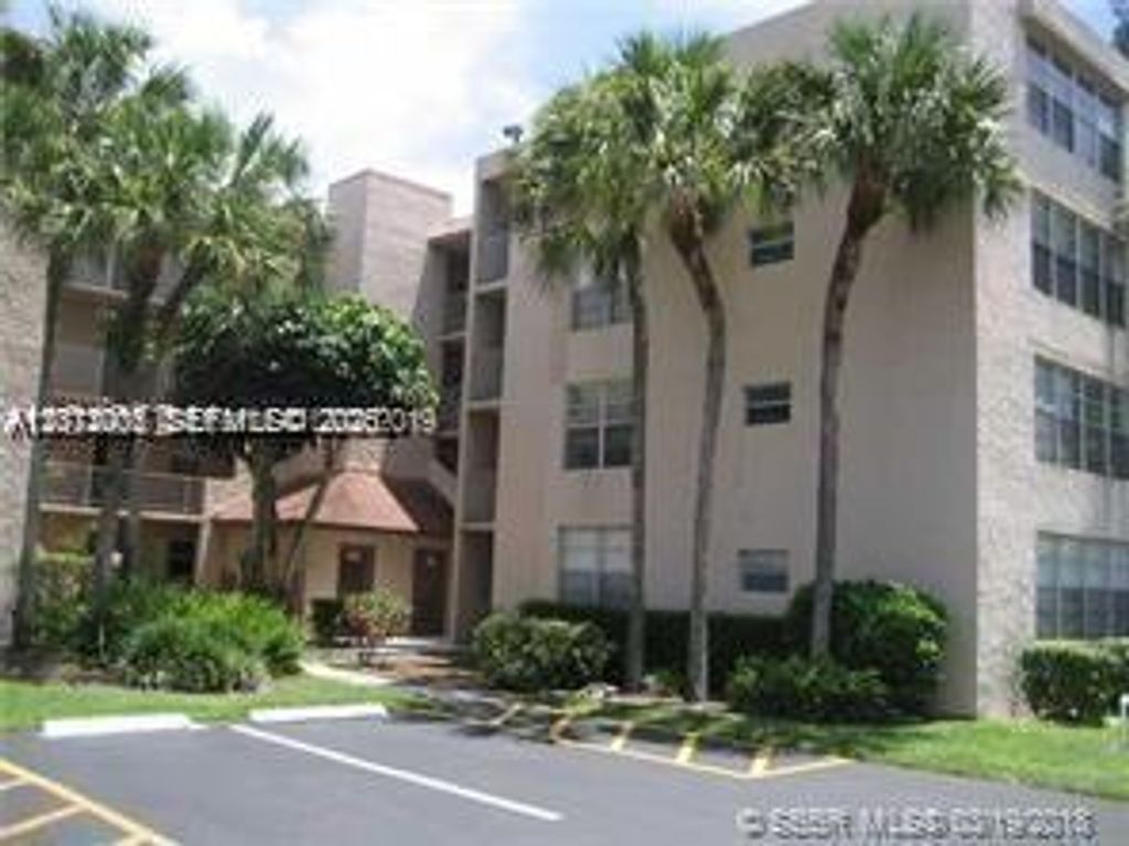 Photo of 9470 Live Oak Pl #306, Davie, FL 33324 (MLS # A12012002)