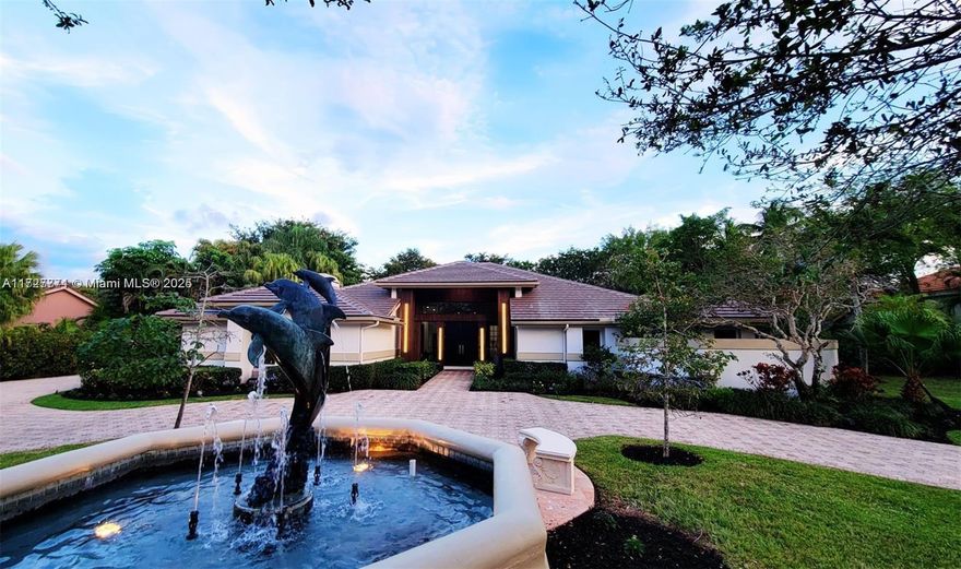 STOP AND READ THIS! This rare, expansive Parkland home is perfect for CEOs, entrepreneurs, or company directors seeking a space for entertainment and high-level networking. Featuring a 15-foot quartzite island, a sous vide station, dual dishwashers, and an 86-bottle wine cooler in the chef's kitchen, plus a butler's kitchen for seamless events. Six ensuite bedrooms, a newly renovated master bath, and a new home theater offer luxury and comfort. Hurricane-proof windows, a new roof, and a Wyland fountain set the tone for elegance. With lush grounds and a brand new outdoor kitchen, this home is designed to impress. Schedule a tour today – make this your next power move.