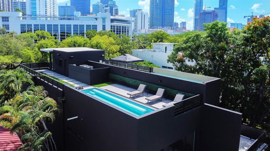 Experience the epitome of luxury living just outside of Brickell, Miami's vibrant financial district and urban center. These exclusive residences offer an unparalleled lifestyle with exceptional design & premium features. Magnificent three-bedroom,three-and-a-half-bathroom residence that boasts 2,980 sq ft of elegantly designed living space under A/C.The highlight of this home is the private rooftop terrace with a pool,offering panoramic views of Brickell's skyline.The master bedroom is a sanctuary, featuring a private garden patio,LED-lit closets, & integrated speakers powered by a Sonos amplifier.The second floor houses a spacious family room that opens onto a large balcony,perfect for entertaining or relaxing while taking in the urban vista.Can come furnished with furniture pictures.