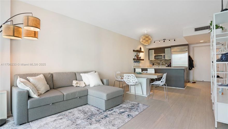 Experience the best of Brickell living in this fully updated 1BD/1BA condo with a large private balcony showcasing breathtaking views of the bay, park, and iconic skyline. The unit features a recently renovated bathroom, brand new in-unit washer/dryer, and hurricane impact windows throughout. Enjoy resort-style amenities including a fully equipped gym, spa, sauna, jacuzzi, and rooftop pool. Perfectly located just steps from top restaurants, cafés, shops, and Brickell City Centre. Currently leased for $3,000/month until January 22, 2026 — ideal for investors or future end-users.