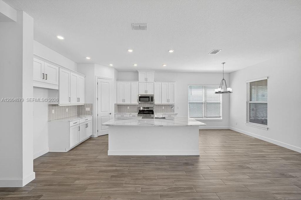 Photo of 13605 SW Alejandro Court, Port St Lucie, FL 34987 (MLS # A12004079)