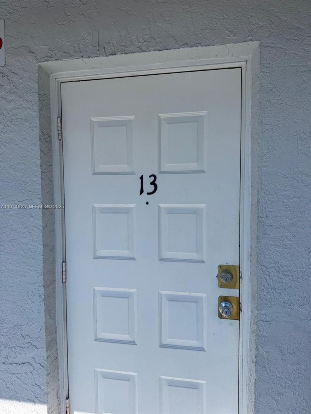 Photo of 2401 Van Buren St #Unit 13, Hollywood, FL 33020 (MLS # A11944928)