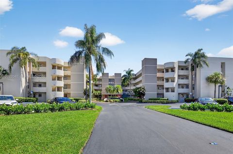 Photo of 5901 Camino Del Sol #207, Boca Raton, FL 33433 (MLS # A12032041)