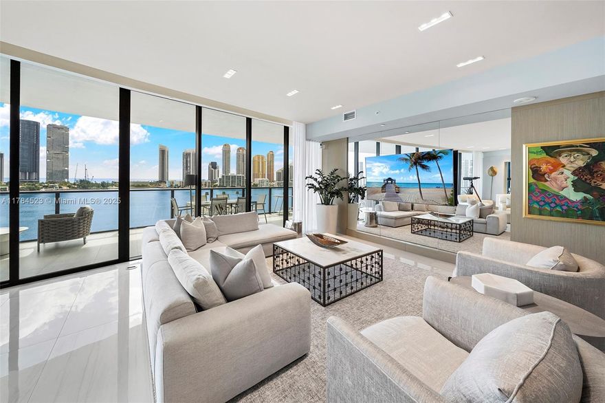 Exceptional 4-bed, 5.5-bath sky residence with panoramic water views of Sunny Isles & the Intracoastal. Enjoy a private terrace with summer kitchen, sunlit open living spaces, smart home tech, and a gourmet kitchen with pantry + extra fridge/freezer. Private foyer doubles as an office. Luxurious primary suite with spa bath & custom closets. Features include dropped ceilings, LED lighting, and electric blackout shades. Prive Island offers resort-style amenities: gym, pools, wine cellar, tennis, walking path & more—ultra-private, ultra-luxurious.