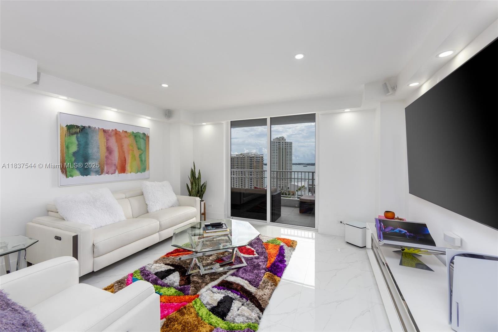 Completely Redesigned & Remodeled 2 Bedroom 2 Bath with Bay Views and Amazing upgrades & Custom built-ins! Beautiful extra large white porcelain tiles throughout, Open Kitchen with Samsung Stainless Steel appliances, LG Full Size washer & dryer, White Italian cabinets and Elegant Carrera Counters! Beautifully updated bathrooms! Huge California Walk-In Closets! LED Recessed lighting throught the apartment! Large Balcony for awesome entertaining! Come to Brickell Key...your Island Oasis...and move right into this 100% turn-key apartment and start enjoying the Island Life! Elegance + Sophistication is what you will get in this Chic, Ultra Modern 2/2 that epitomizes the Coolness & Glamour of Miami's Brickell neighborhood!
VACANT & EASY TO SHOW ANYTIME! CALL LISTING AGENT CARLOS!