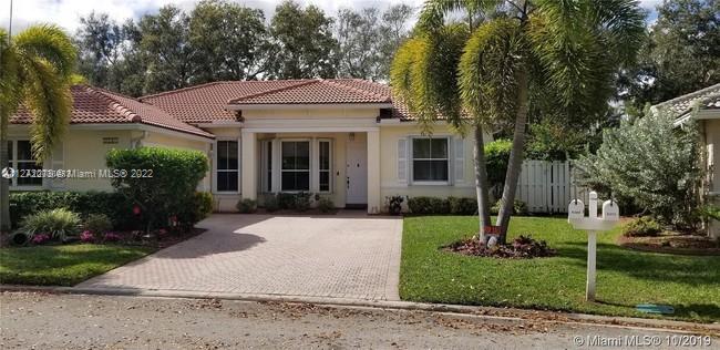 Beautifully Landscaped POOL HOME on Extra Large 8,656 sq.ft. Lot in much desired Oakridge Gated Community. 3 Bedroom + Family Room + 2 Baths, split bedroom floor plan. Patio w/Pavers Heated Pool & Hot Tub, 2 Car Garage, Upgraded Large Eat-in Kitchen w/Breakfast Area at Windows, kitchen has Extra Tall Custom Wood Cabinets Designed w/Glass Doors, Accent Lighting & Soft-close Drawers,Granite Counters & Stone Backslash.