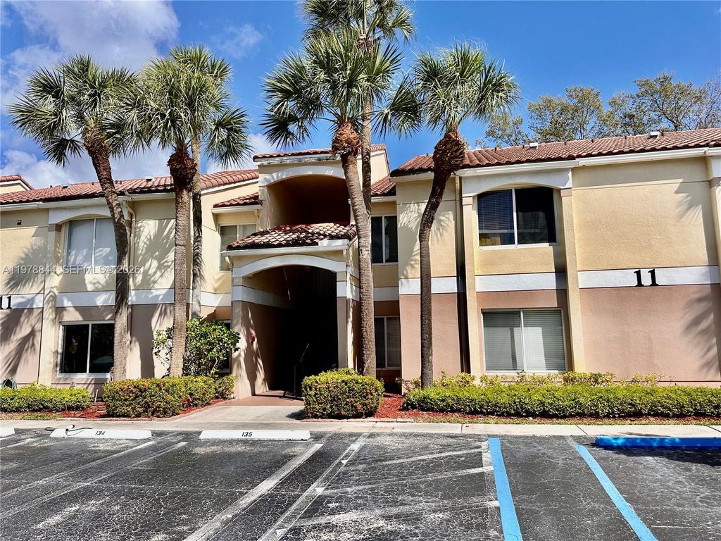 Photo of 815 W Boynton Beach Blvd #11-202, Boynton Beach, FL 33426 (MLS # A11978844)