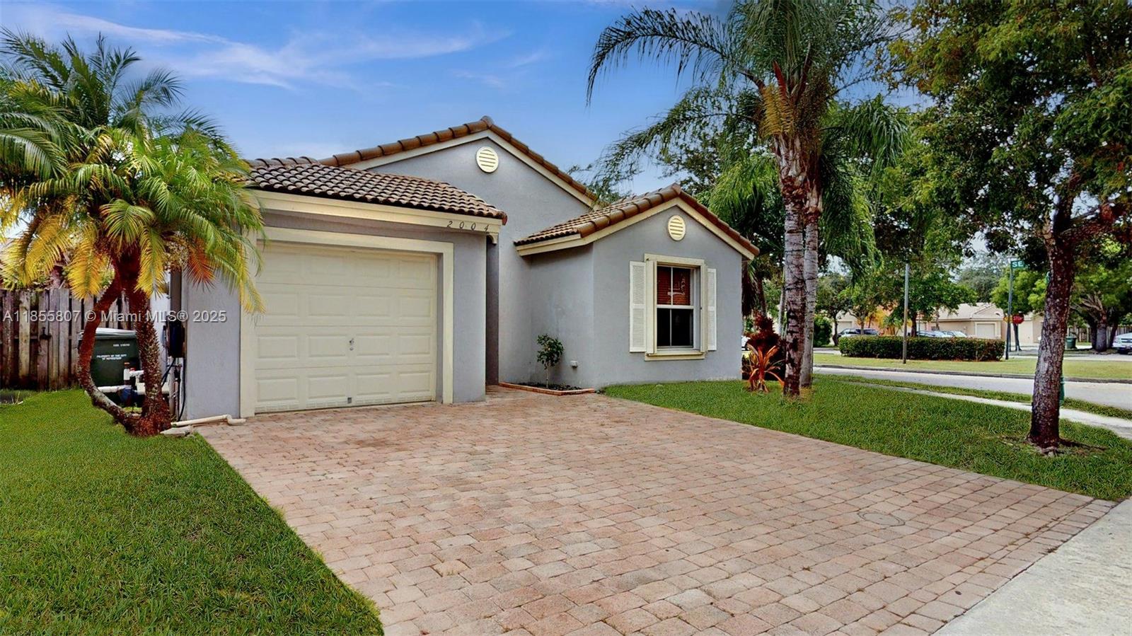 Welcome to this charming 3-bedroom, 2-bathroom, 1 car garage, pool home on a corner lot located in the family-friendly gated community in the Shores of Keys Gate. Enjoy the pool view and a spacious floor plan designed for modern living. With high ceilings and plenty of natural light throughout, creating an inviting atmosphere that complements any décor style. The layout provides seamless flow between the living, dining, and kitchen areas. Located in a secure neighborhood with a 24 hour manned gate, community pool, cable, internet and alarm, this home offers the perfect blend of comfort, style, and convenience. Centrally located, minutes from shopping centers and main highways for trips to the Florida Keys. Text Listing Agent to schedule your private tour today! (24-hour notice required).