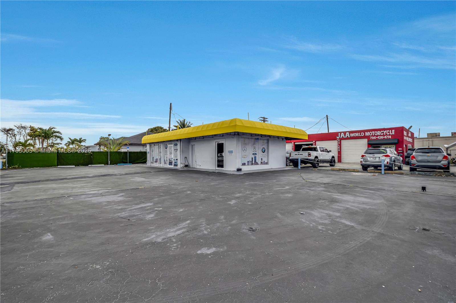 Unique opportunity 5600 about 3600sqft for $6,000.00 a month and 5612 E 8th over 7700sqft for $8,500 a month. Both Lots are available, Total Area 5600-5612 (11,264sqft) Also, 5612 includes a secure garage set up with two side-by-side rolling doors, each providing access to a separate car bay. Unlock the potential of your automotive or marine business with this exceptional corner lot, formerly used as car dealership featuring updated separate office space and baths for each lot and ample space for inventory. Strategically located in a high-traffic area. The Florida Department of Transportation reports 15,800 vehicles pass this location daily. This property is designed to accommodate up to 20 vehicles on small lot/ 40 larger lot, making it an ideal spot for maximizing sales and visibility.