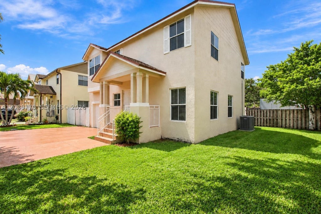 Photo of 10251 NW 3rd St, Pembroke Pines, FL 33026 (MLS # A12089770)