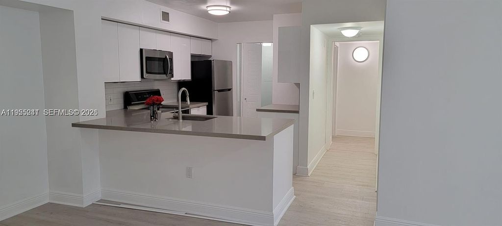 Photo of 12124 Saint Andrews Pl #201, Miramar, FL 33025 (MLS # A11955241)