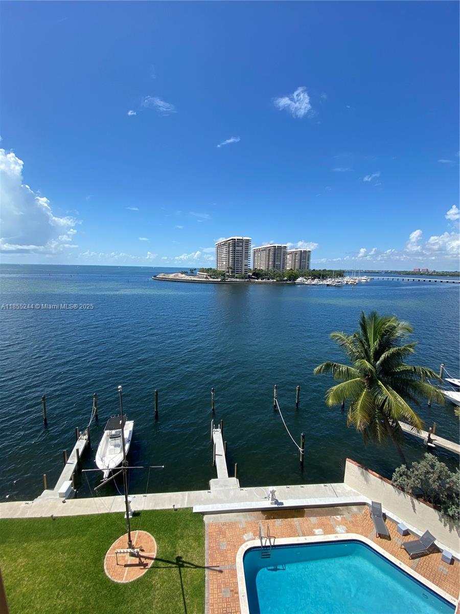 At the Pelican Reef Condo you can walk into this magnificent space and fall in-love! Completely remodeled a few years ago, also was completed refreshed & repainted. This corner unit features Open Ocean views from the moment you walk in, into the kitchen, dinning room, living room and Master bedroom. All with open and unobstructed ocean views. Electronic shades all around the property. Balcony right of the kitchen and dinning area. Another spacious balcony off the living room and master bedroom! Will be freshly painted for new tenant. This boutique condo building is in the heart of Coconut Grove. Very close to Mercy Hospital.