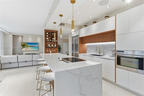 Photo of 3500 Mystic Pointe Dr #104, Aventura, FL 33180 (MLS # A12028701)