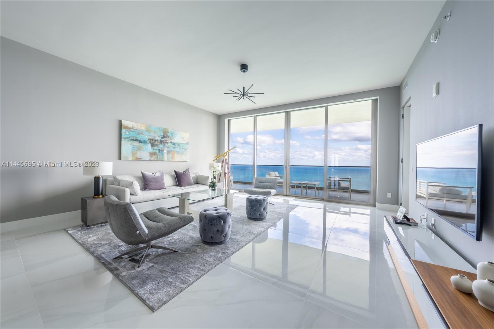 Perched on the 40th floor of the Residences by Armani/Casa is this magnificent three-bedroom five-bathroom condo with breathtaking ocean and intracoastal views. Exquisitely designed by Giorgio Armani and Architect Cesar Pelli, this residence offers private elevator entry and boasts 10 ft ceilings with Statuario porcelain tile floors throughout. Features include additional den space and powder room quarters, subzero and wolf appliances with stone countertops, automatic screen roller shades, two storage rooms, and over 1000 SF of outdoor living space equipped with a summer kitchen. Enjoy exclusive resort-style amenities such as pool services, a spa and fitness center, bar, restaurant, cigar, and wine lounge, movie theater, kids room, direct beach access, and much more.