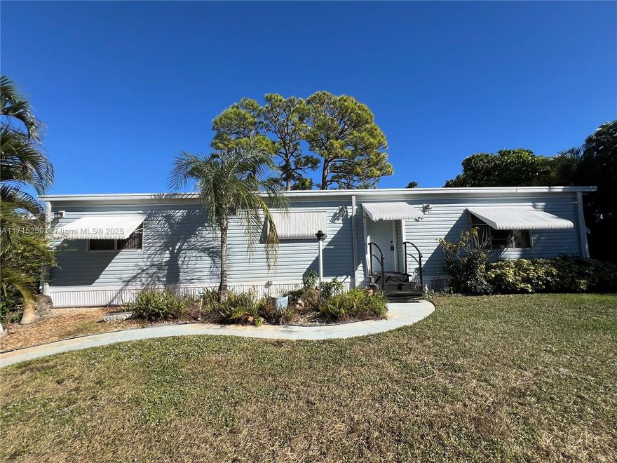 No Reasonable Offer Refused! MOTIVATED SELLER! Update Your Way-Bring offers!! Discover your ideal affordable retirement oasis in this 2 bedroom, 2 bath manufactured home located on a prime spacious corner lot in gated community of Jamaica Bay in Boynton Beach. Update your way Endless possibilities w/enclosed patio perfect for relaxing or entertaining. Unlike many mobile home parks, there is no land lease. Member owned, eliminating large monthly land lease fees associated for similar communities. This is your chance to create your dream space in a vibrant, friendly neighborhood with plenty of social opportunities including swimming pools, clubhouse, shuffleboard & bocce courts for active fun. All sizes & info approximate, not guaranteed & to be verified by buyer.