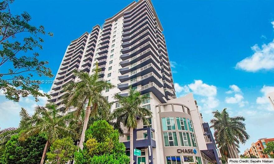 22-story residential building. Building amenities: Large swimming pool and jacuzzi. Fully equipped fitness center, 24-hour security desk, 1 Covered, assigned parking, Multimedia theater and social room, Business center, Terraces with bay and city views, Granite countertops, In-unit washer and dryer, Nearby conveniences: Publix Super Market: A Publix is located one block away, making grocery shopping convenient. Chase Bank: A Chase Bank is at the base of the building. Dining: The building is close to various dining options in the area. Arts and Entertainment: The building is near the Performing Arts Center and the Wynwood District, Downtown, Midtown, Adrian Arts Center, Patricia Frost Mueum, Perez Art Museum, Parks: Margaret Pace Park is a few blocks east of the building. Bay View, A special assessment of $202.98 per month