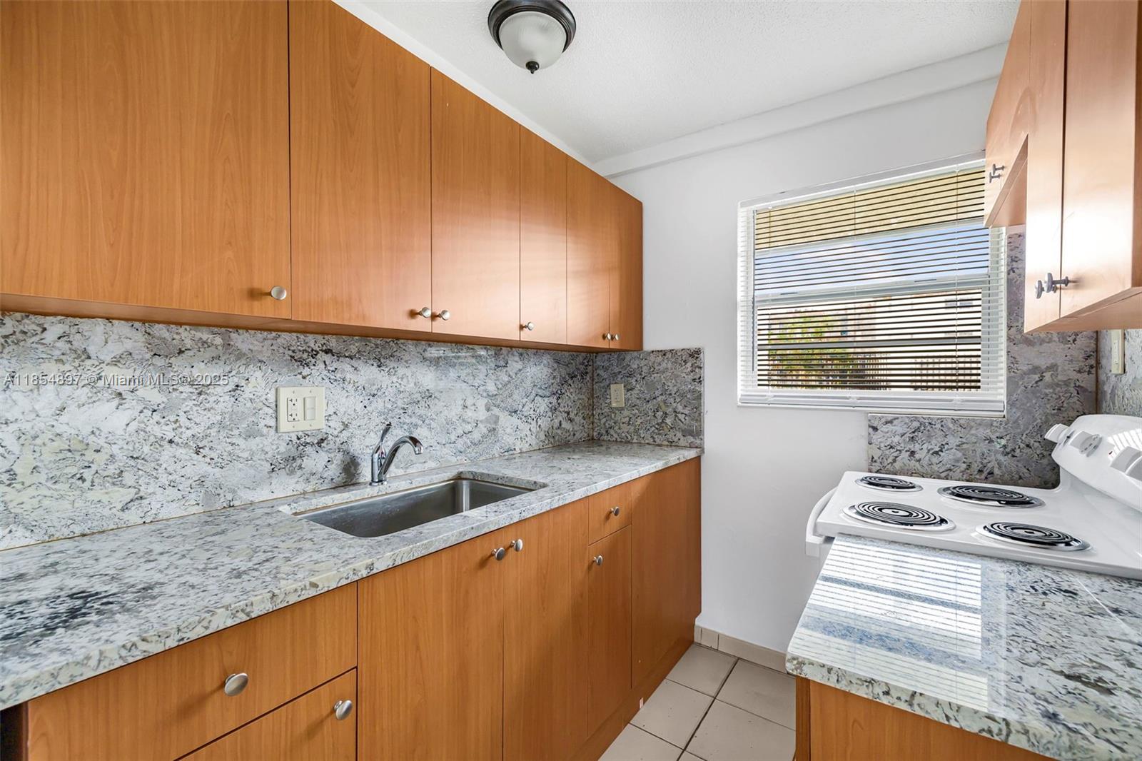 1 bedroom, 1 bathroom apartment in Flagami. This ample unit features tile flooring, freshly painted walls, convenient kitchen & central ac. Water is included within rent. Minutes away from shopping plazas and major highways. Includes 1 parking spot. Washer & dryer facility in building. Landlord will accept first and security to qualified applicant.