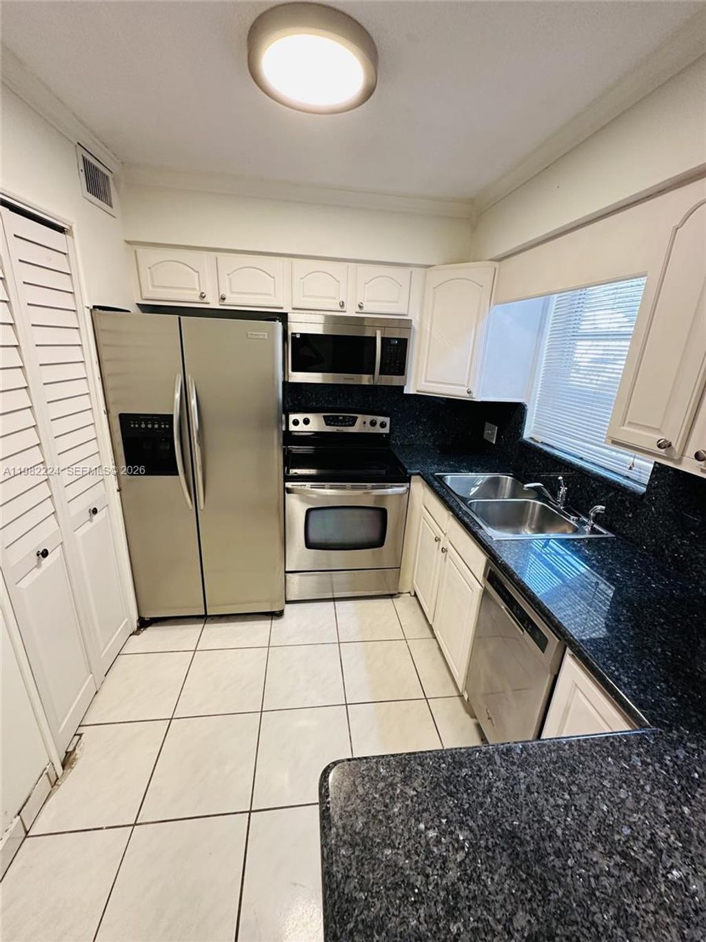 Photo of 2319 Jackson St #6, Hollywood, FL 33020 (MLS # A11982224)
