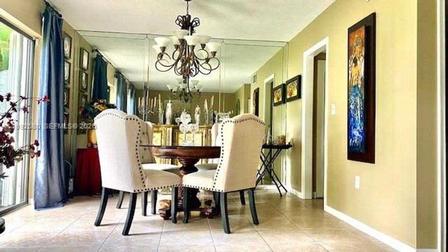 Townhome in highly sought after community of Sabal Chase.  Upon entering this beautiful townhome you are welcomed with loads of natural light and an incredible view of the clubhouses tennis courts.  Ample amount of kitchen cabinets, pantry, stainless steel appliances, gas range.  Washer and dryer are conveniently located near kitchen in a laundry closet.  Primary bedroom has walk-in closet and overlooks tennis courts as well.  Spacious bedrooms with plenty of closet and storage space.  Detached 2 car garage with finished attic.  Private court yard in addition to wood deck both ideal for entertaining and relaxing.  Clubhouse is just outside your back door, offering large swimming pool with lounging area, tennis and pickle ball courts, basketball court, gym and billiards. Basic cable is included in Association fees.  Boat and camper parking is available (fees apply).   A 1 year home warranty is included.